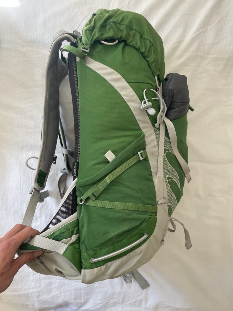 Left side of an Osprey Talon 33, showing the cinch straps.