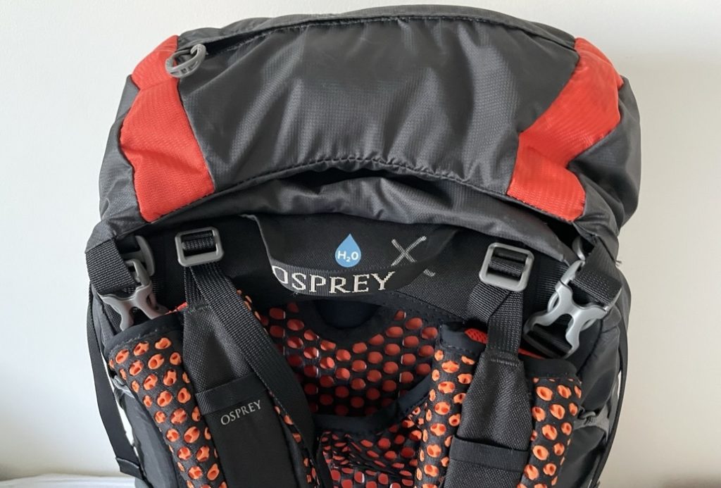 Osprey Exos 58 Blaze (black & orange) - view of clips to remove 'brain'